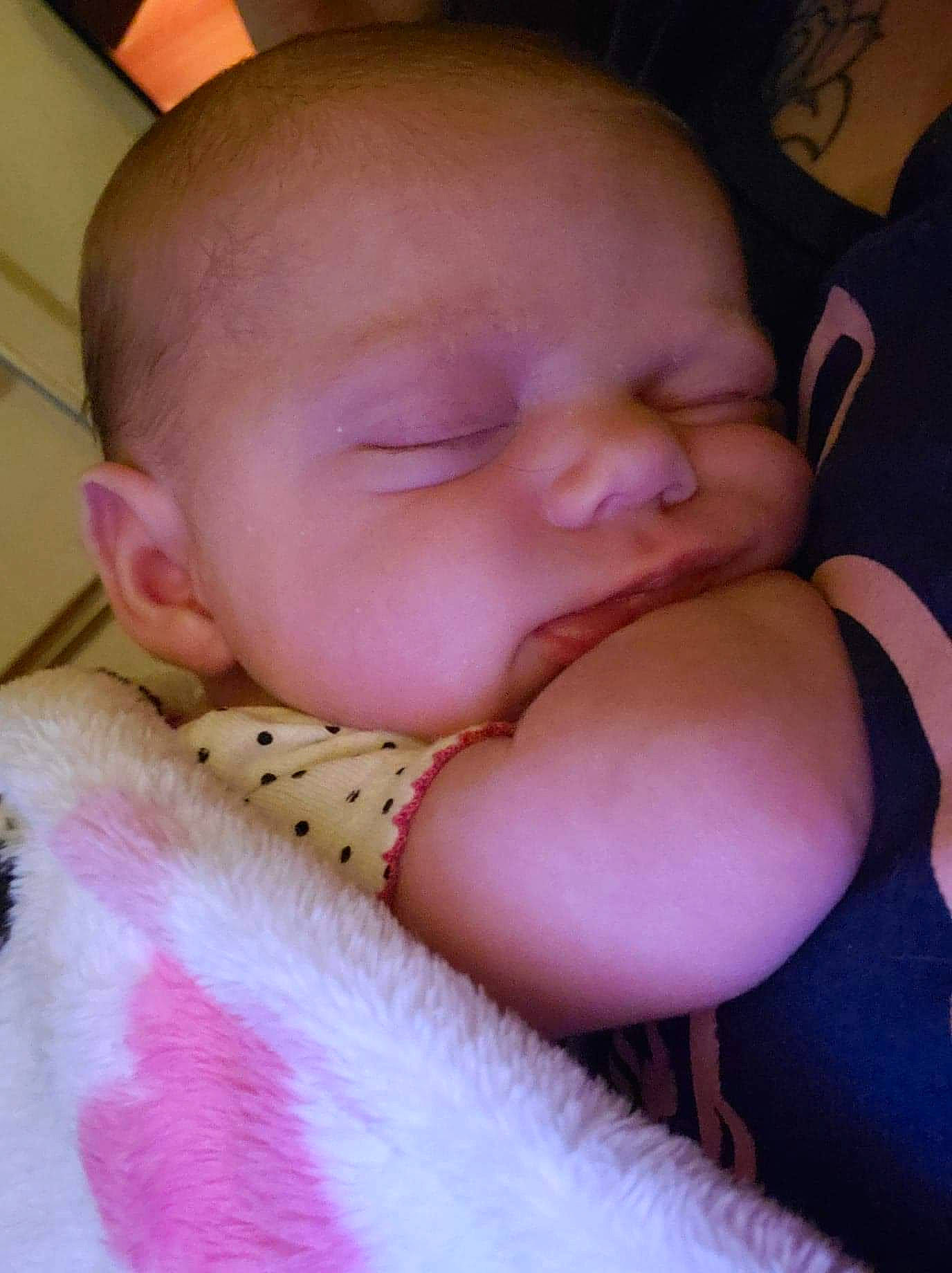 Katelyn joined the competition — help win amazing prizes! baby, cheek, child, chin, close_up, ear, eye, face, finger, hand, head, lip, mouth, nap, nose, person, pink, purple, skin, sleep