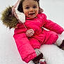 Tessa joined the competition — help win amazing prizes! child, toddler, snow, pink_snowsuit, winter_clothing, hood, fur_trim, boots, bow, smiling, outdoor, cold_weather, sitting, face, happy, snowy_ground, cute, winter, playful, person