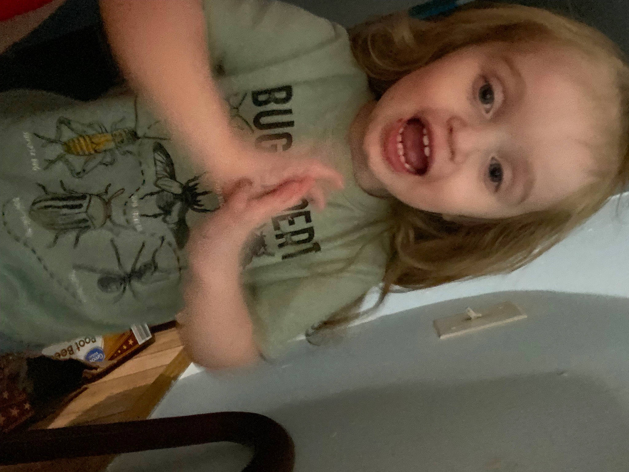 Eli is registered to the contest to win money with this photo: baby, cheek, ear, eye, eyebrow, eyelash, finger, gesture, happy, human_body, iris, jaw, lip, mouth, nose, person, sleeve, smile, thumb, toddler