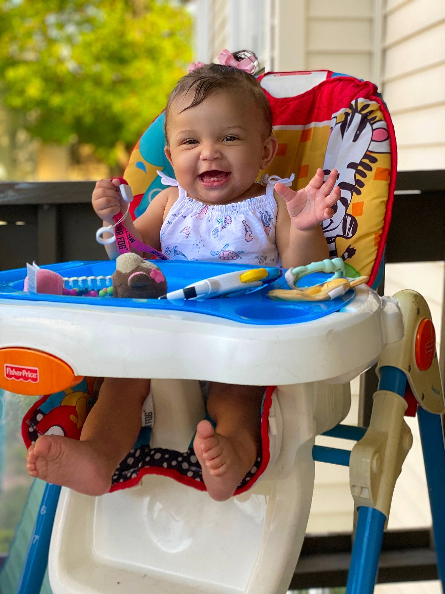 Lailani is registered to the contest to win money with this photo: baby, baby_toddler_clothing, child, electric_blue, fun, happy, joy, leisure, outdoor_furniture, person, photograph, recreation, red, shorts, sitting, skin, smile, snapshot, t_shirt, toddler