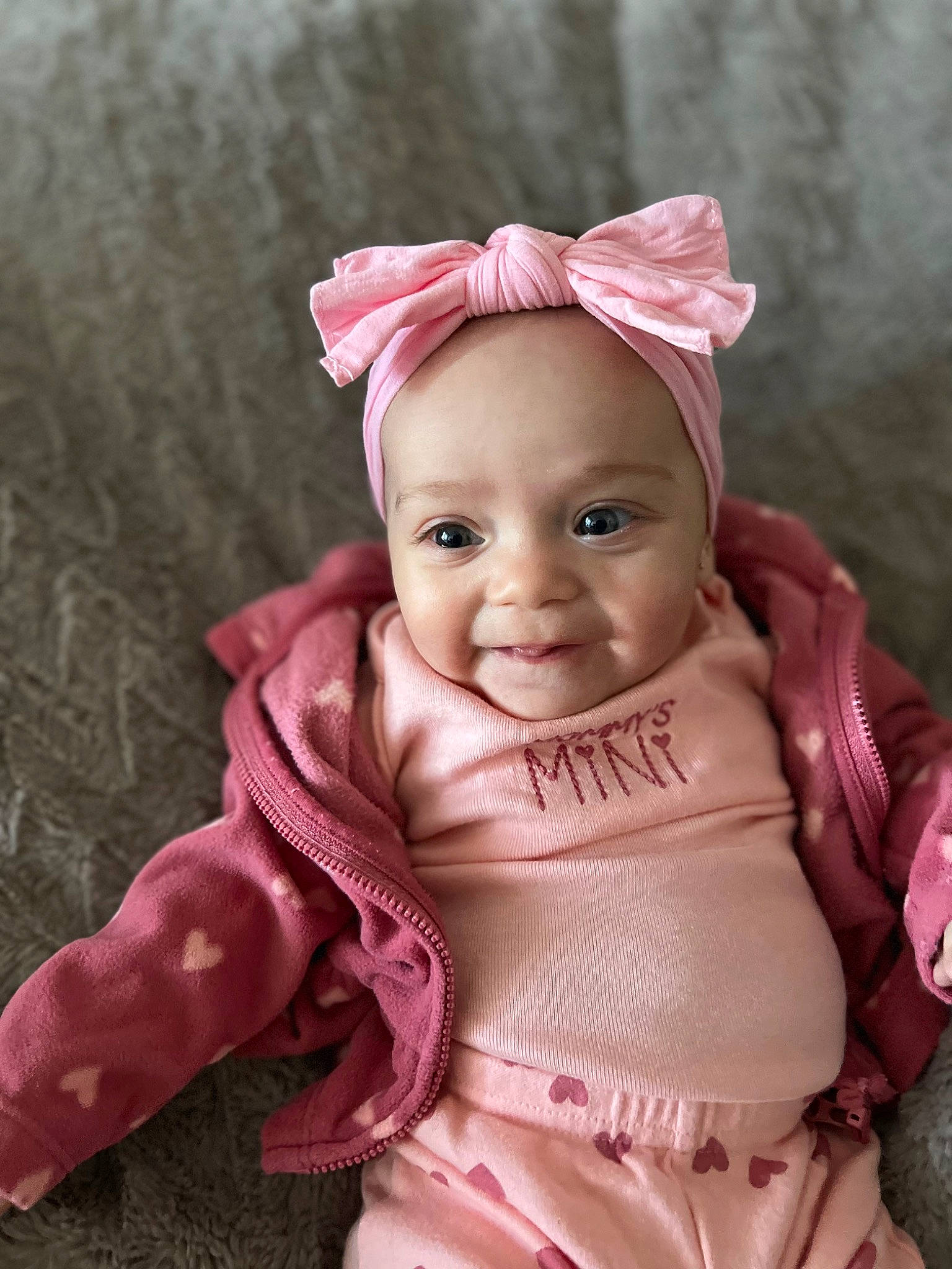 Loriena is registered to the contest to win money with this photo: baby, baby_toddler_clothing, cap, cheek, chin, costume_hat, dress, eye, face, fashion_accessory, happy, head, headgear, human_body, lip, magenta, person, pink, sleeve, smile