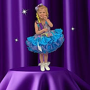 April joined the competition — help win amazing prizes! child, girl, dress, trophy, purple, blue, curtain, stage, award, smile, pose, shoes, ribbon, sparkle, celebration, proud, portrait, costume, event, performance