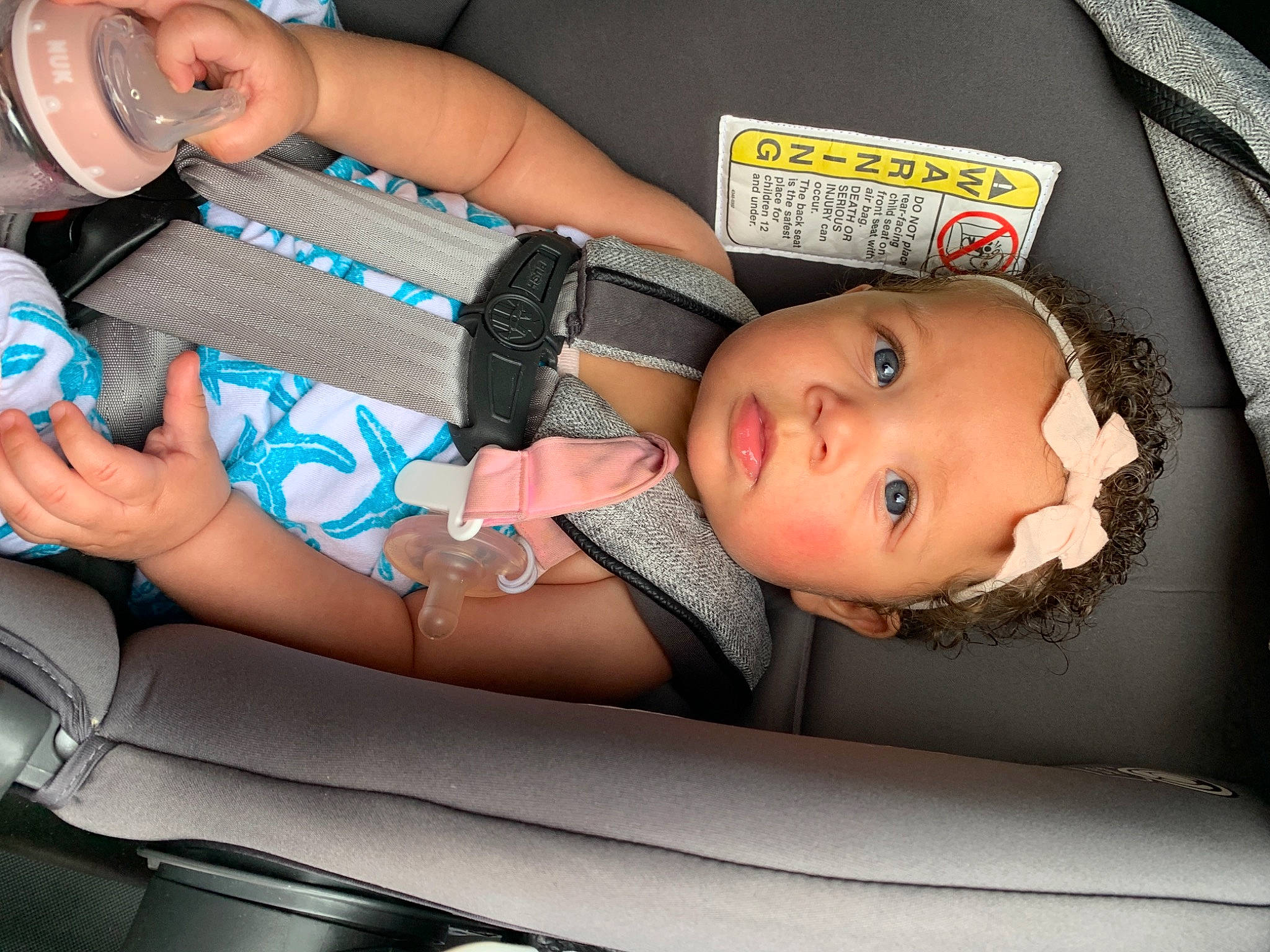 Cora joined the competition — help win amazing prizes! arm, baby, baby_products, car_seat, chest, comfort, eye, finger, hand, human_leg, joint, knee, leg, mouth, nail, person, skin, thigh, toddler, trunk