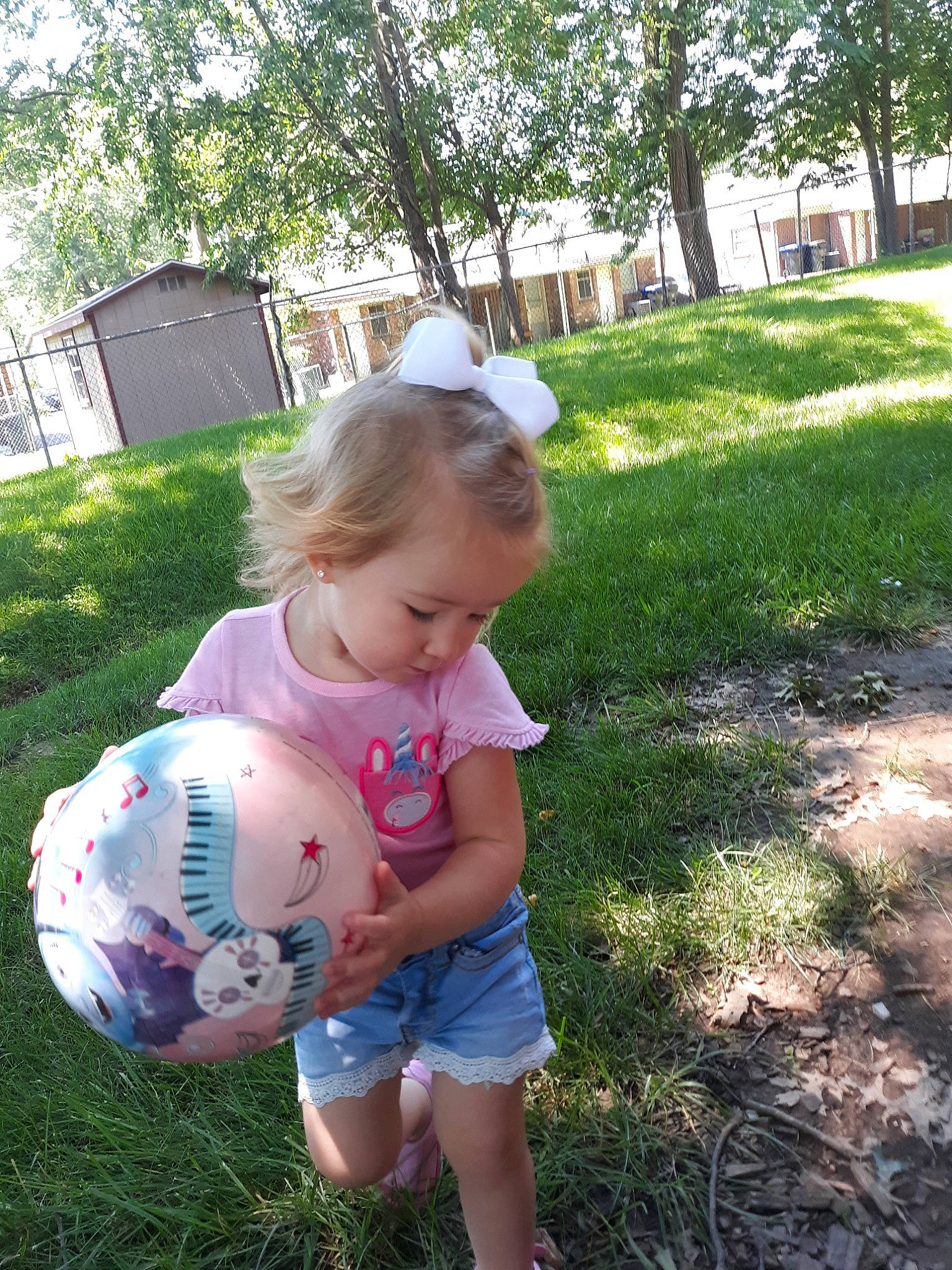 Kynslee joined the competition — help win amazing prizes! ball, child, fun, grass, lawn, person, play, soccer_ball, summer, toddler, yard