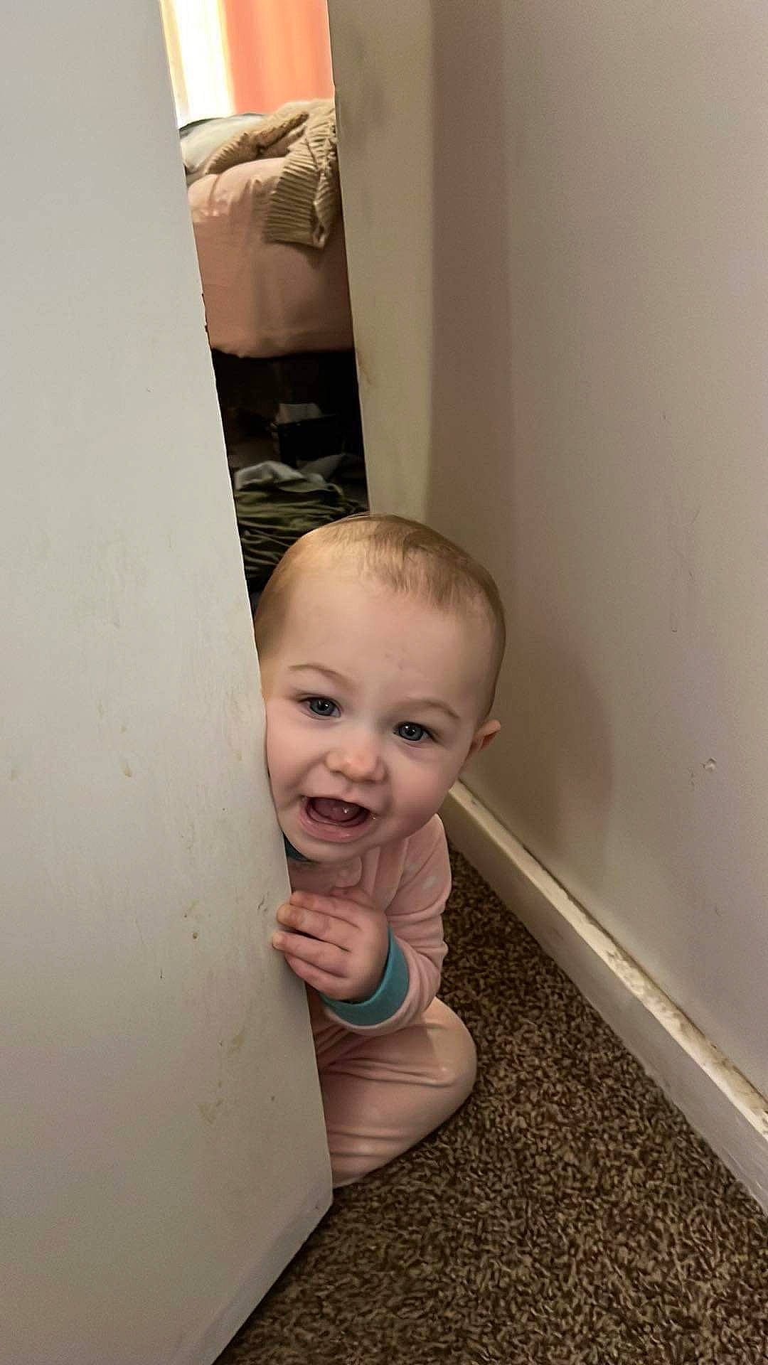 Meela is registered to the contest to win money with this photo: art, baby, baby_toddler_clothing, ceiling, chair, cheek, child, floor, flooring, fun, happy, hardwood, person, plaster, room, sitting, smile, suit, toddler, wood