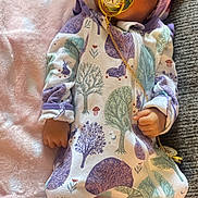 Ahmiyah joined the competition — help win amazing prizes! baby, blanket, bonnet, clothing, coat, couch, dress, face, furniture, hat, head, homedecor, jacket, newborn, person, photography, portrait, quilt, sitting, sleeping