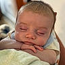 arms, baby, blanket, calm, child, closeup, comfort, cute, face, hand, indoors, infant, newborn, peaceful, portrait, resting, skin, sleeping, soft, warm