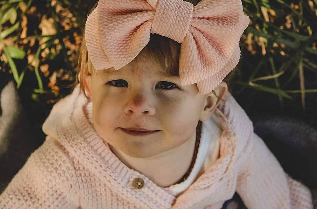 Samantha joined the competition — help win amazing prizes! baby, cap, cheek, child, face, fashion_accessory, fun, grass, happy, headgear, headwear, knit_cap, lip, nose, person, plant, skin, sleeve, smile, toddler