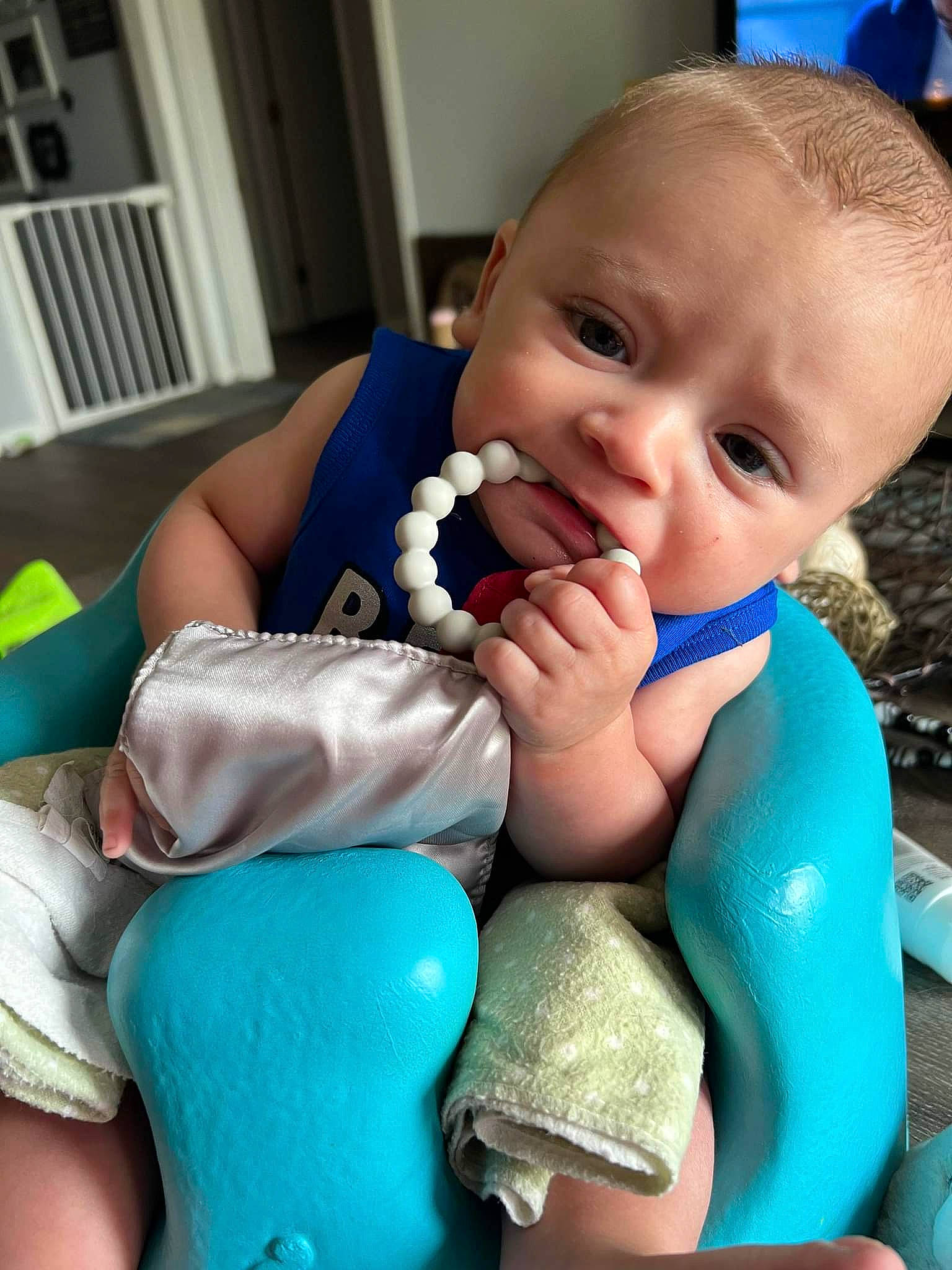 Chance is registered to the contest to win money with this photo: baby, baby_products, baby_toddler_clothing, blue, cheek, child, drinkware, electric_blue, eyelash, finger, fun, gesture, happy, head, mouth, nail, nose, person, skin, thumb