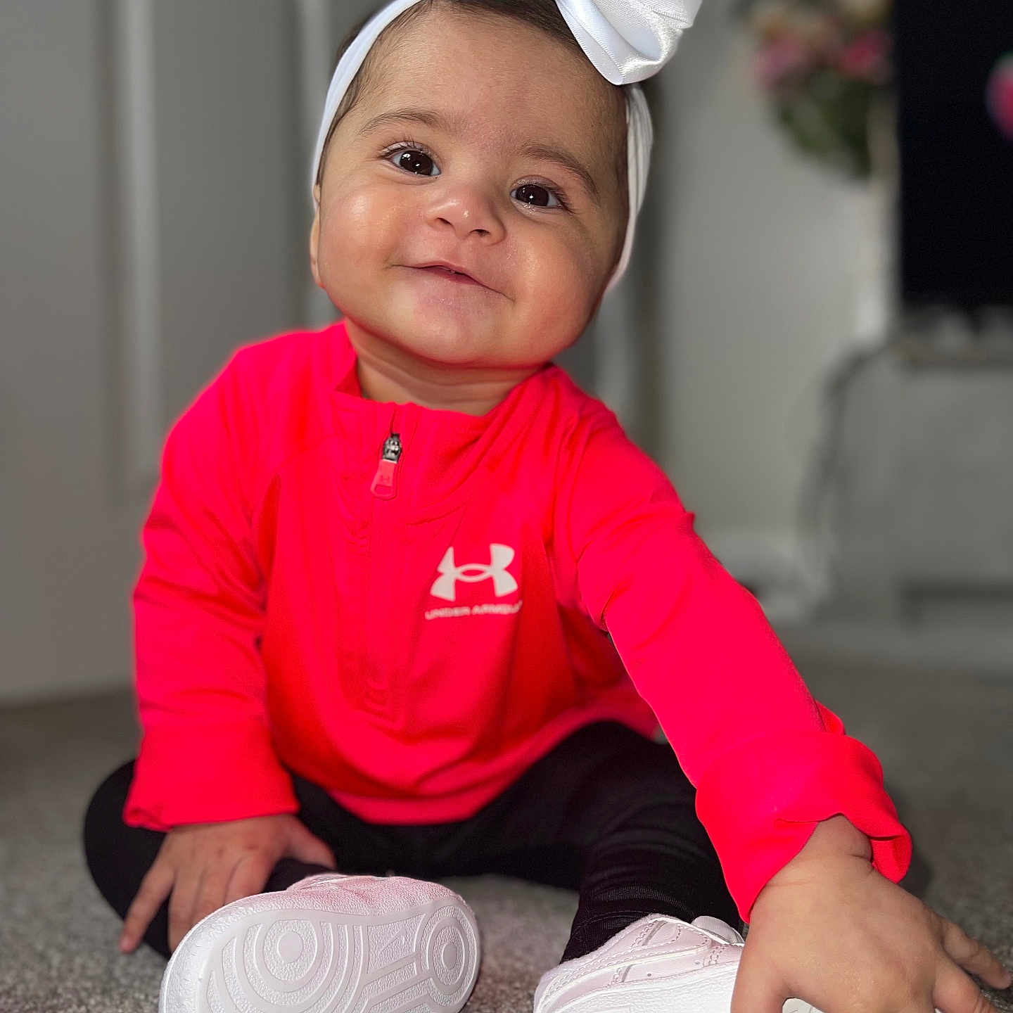 Alaia is registered to the contest to win money with this photo: accessories, baby, bodypart, clothing, diamond, face, finger, footwear, gemstone, hand, hardwood, head, jewelry, pants, person, photography, portrait, shoe, sitting, wood