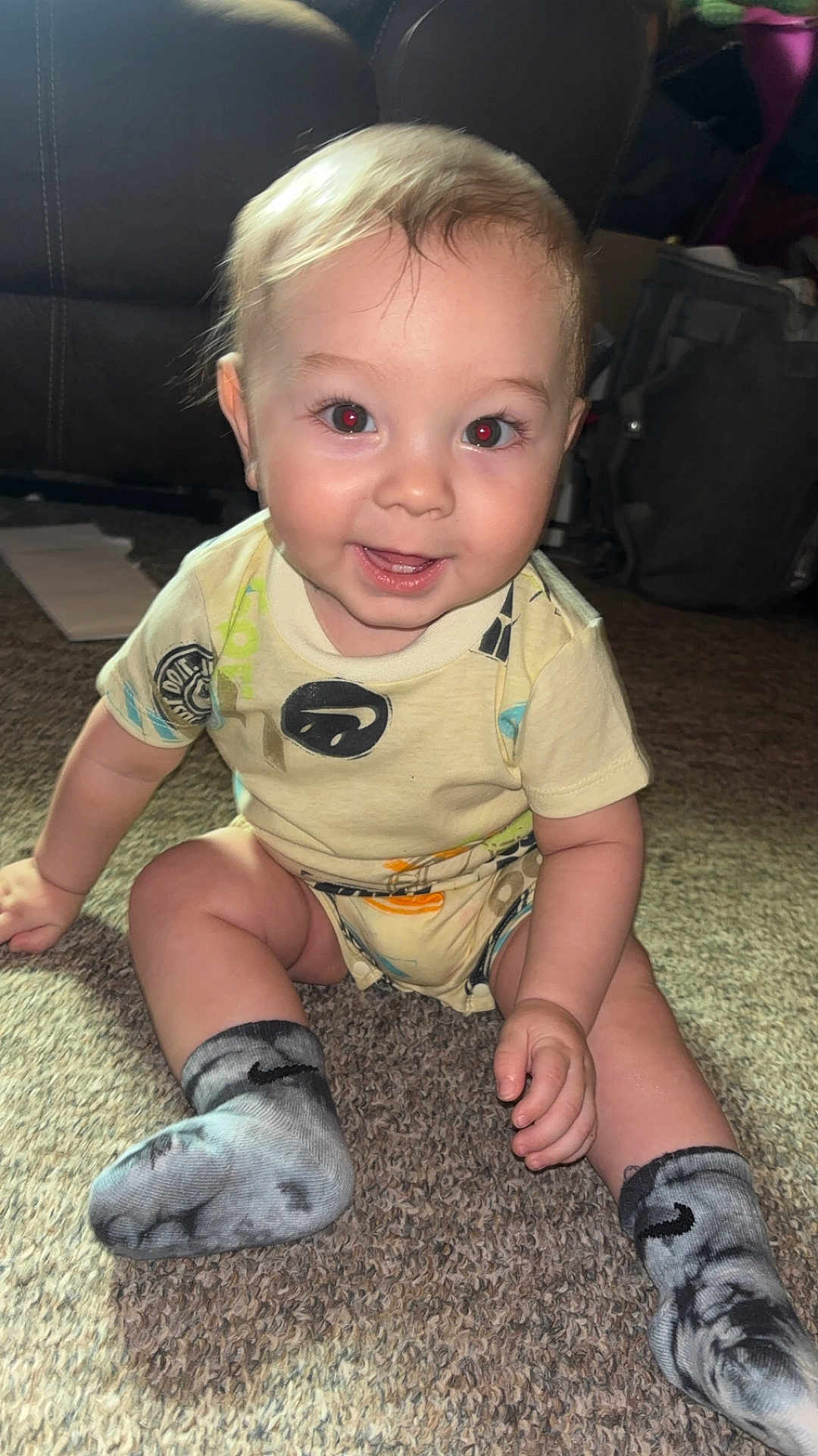 Kingston joined the competition — help win amazing prizes! baby, child, smiling, sitting, carpet, onesie, socks, indoor, face, happy, cute, infant, person, young_child, red_eye, blond_hair, hand, footwear, candid, portrait