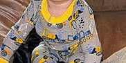 Kingston joined the competition — help win amazing prizes! toddler, child, pajamas, construction_theme, couch, blanket, indoors, foot, hand, curly_hair, window, light, soft_fabric, face, expression, sitting, cozy, home, comfort, cute
