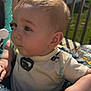 Kingston joined the competition — help win amazing prizes! baby, child, infant, face, hand, outdoor, sunlight, deck, railing, clothing, patterned, toy, curious, cheeks, skin, young, person, seated, daylight, closeup