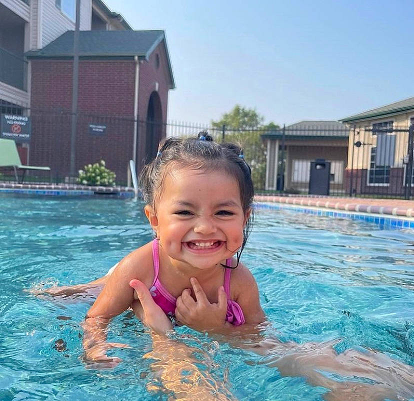 Eliza is registered to the contest to win money with this photo: aqua, azure, baby, bathing, chest, fun, happy, joy, leisure, leisure_centre, person, recreation, sky, smile, sports, summer, swimming_pool, swimwear, toddler, vacation