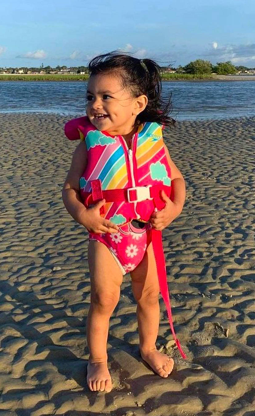 Eliza joined the competition — help win amazing prizes! baby_toddler_clothing, beach, cloud, coastal_and_oceanic_landforms, fun, happy, head, leisure, mammal, people_in_nature, people_on_beach, person, sand, shore, sky, smile, summer, thigh, toddler, vertebrate