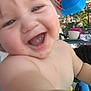 Keith joined the competition — help win amazing prizes! toddler, child, smile, happy, face, close_up, outdoor, swing, bench, plant, pot, daylight, skin, arm, person, nature, play, joy, portrait, expression
