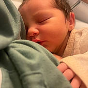 Giulia a rejoint le concours — aidez-le/la à gagner de superbes lots ! baby, blanket, child, closeup, clothing, cozy, cute, face, hand, indoor, infant, newborn, peaceful, portrait, rest, skin, sleep, sleeping, soft, warm