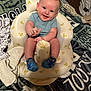 Layton joined the competition — help win amazing prizes! baby, infant, smiling, blue_shirt, socks, inflatable_chair, teddy_bear_pattern, blanket, fabric, cozy, child, happy, indoor, cute, person, soft, seated, small_hands, playful, comfort