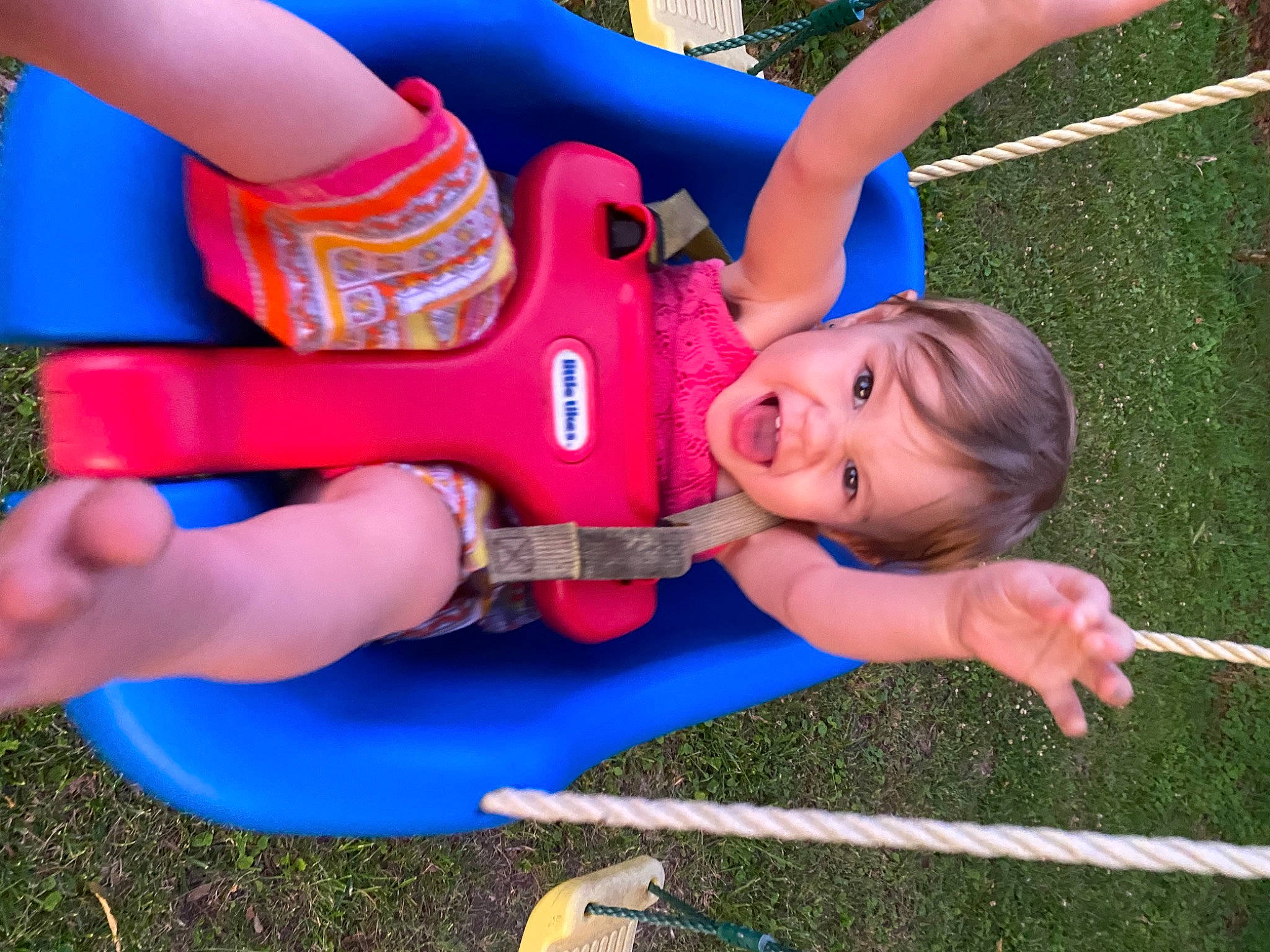 Lorelai joined the competition — help win amazing prizes! baby_toddler_clothing, blue, child, city, electric_blue, facial_expression, fun, grass, happy, human_leg, leisure, outdoor_play_equipment, person, pink, play, playground, public_space, recreation, shorts, smile