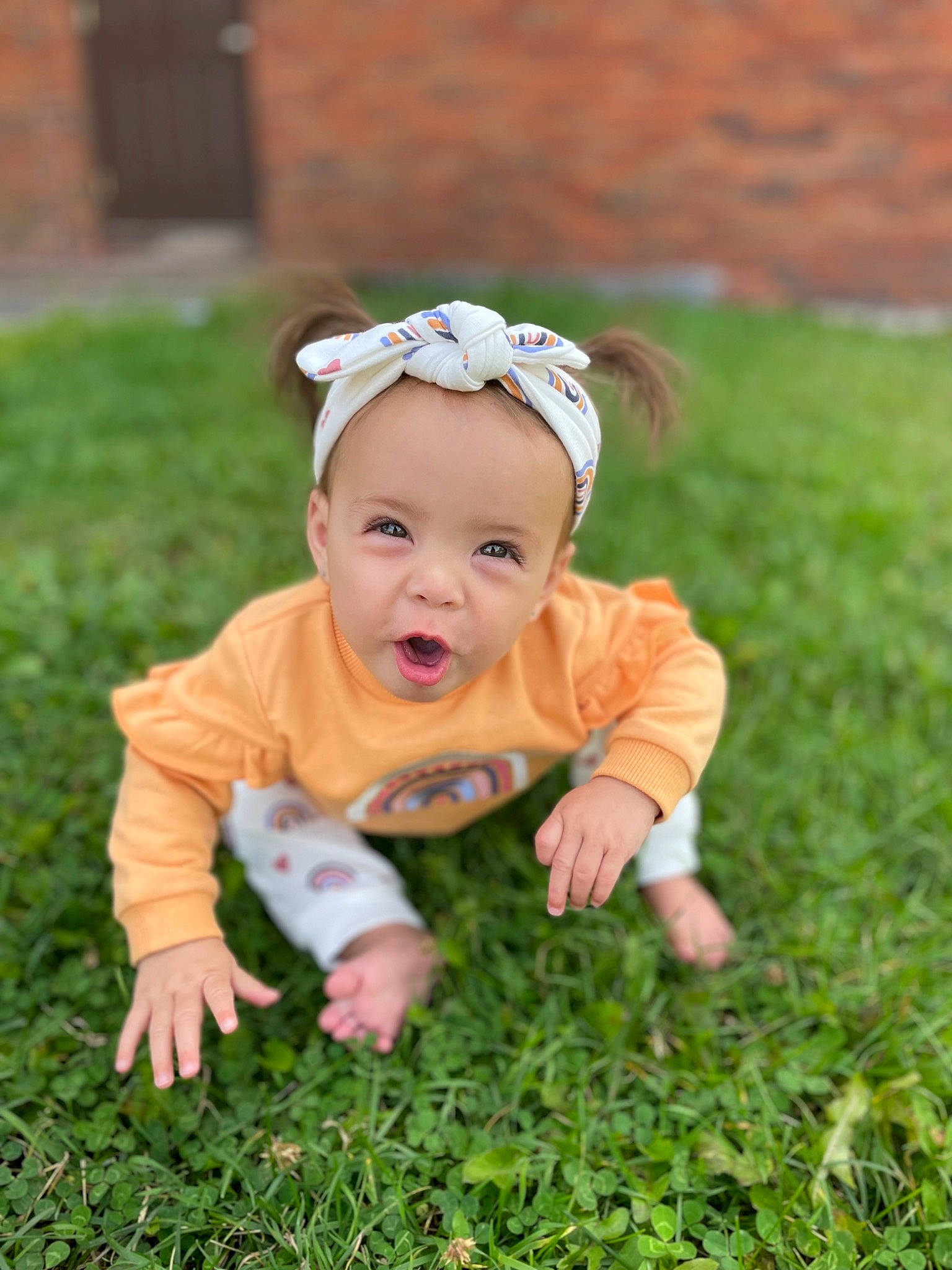 Braelynn is registered to the contest to win money with this photo: baby, baby_toddler_clothing, child, eye, face, flash_photography, flooring, grass, grass_family, grassland, happy, hat, headband, lawn, meadow, people_in_nature, person, plant, smile, toddler