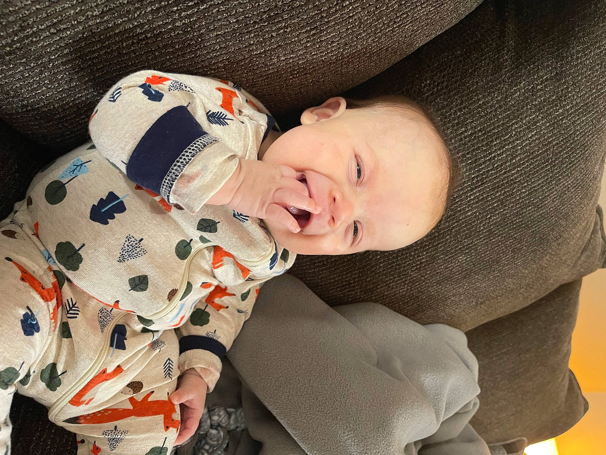 Deacon is registered to the contest to win money with this photo: baby, baby_carriage, baby_products, baby_sleeping, baby_toddler_clothing, cap, carmine, cheek, child, clothing, comfort, happy, headgear, human, outerwear, person, sitting, skin, sleeve, textile