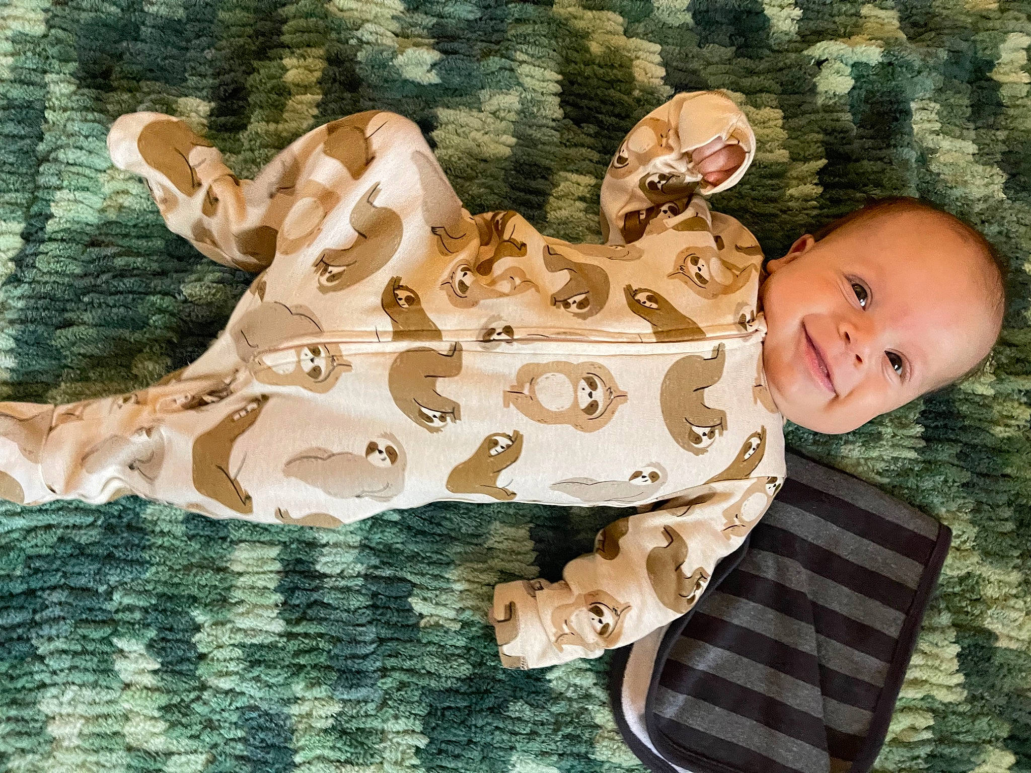 Deacon joined the competition — help win amazing prizes! art, baby, baby_toddler_clothing, child, fawn, font, fun, grass, happy, joy, leisure, pattern, people_in_nature, person, plant, sitting, sleeve, smile, textile, toddler