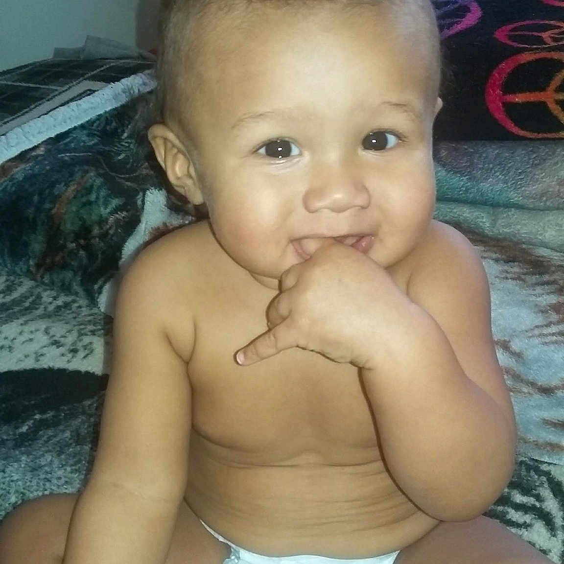Imani is registered to the contest to win money with this photo: baby, cheek, chest, child, chin, eye, eyebrow, face, forehead, fun, head, iris, lip, mouth, muscle, nose, person, skin, smile, toddler
