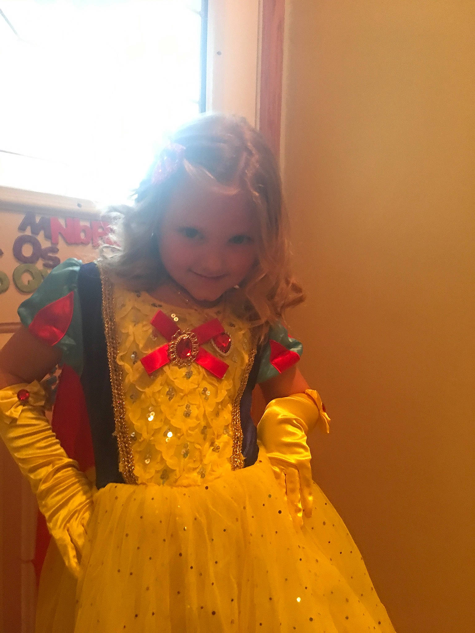 Carli joined the competition — help win amazing prizes! child, costume, costume_design, dress, event, fashion_design, formal_wear, fun, happy, head, human_body, jewellery, joy, necklace, peach, person, ruffle, sitting, skin, smile