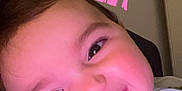 Edzio participe au concours pour gagner de l'argent avec cette photo : baby, cheeks, child, closeup, cozy, cute, expression, eyes, face, happy, indoor, infant, joy, mouth, pajamas, person, portrait, skin, smiling, tongue