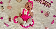 Melody joined the competition — help win amazing prizes! baby, infant, pink_clothing, headband, smiling, lying_down, blanket, heart_shapes, nail_polish, perfume, baby_shoes, toy, decor, cute, happy, portrait, indoor, 4_months, accessories, beauty_room_sign