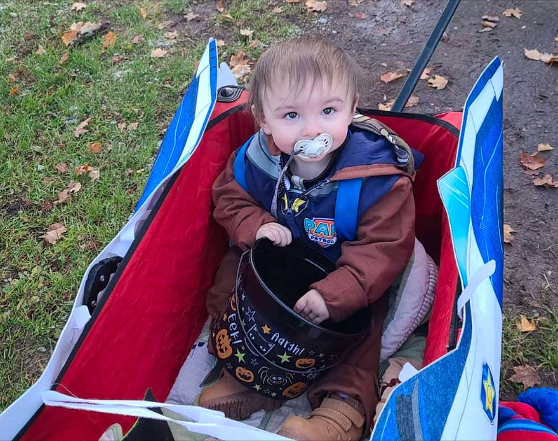 Taylor joined the competition — help win amazing prizes! adventure, baby_carriage, baby_products, blue, boats_and_boating_equipment_and_supplies, camping, chair, child, electric_blue, fun, grass, lap, leisure, outdoor_recreation, people_in_nature, person, play, recreation, sitting, toddler