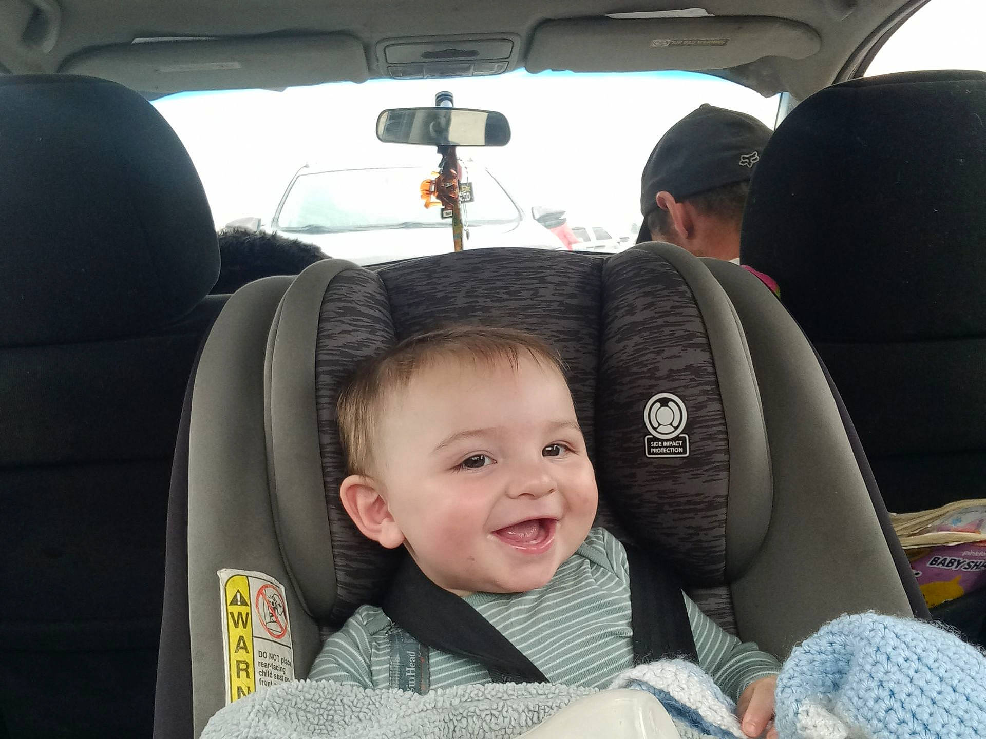 Taylor joined the competition — help win amazing prizes! auto_part, automotive_design, automotive_exterior, automotive_mirror, car, car_seat, car_seat_cover, comfort, head_restraint, joy, mode_of_transport, motor_vehicle, person, personal_luxury_car, seat_belt, smile, steering_part, steering_wheel, toddler, vehicle