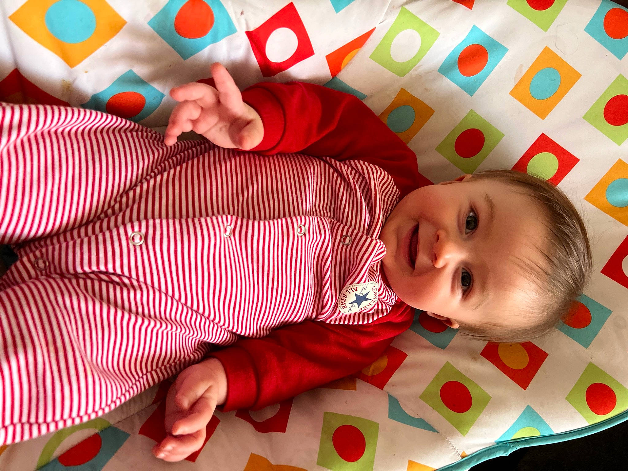 Kamden is registered to the contest to win money with this photo: baby, baby_toddler_clothing, beauty, cheek, dress, finger, green, happy, joy, pattern, person, photograph, pink, plaid, red, skin, sleeve, smile, textile, toddler