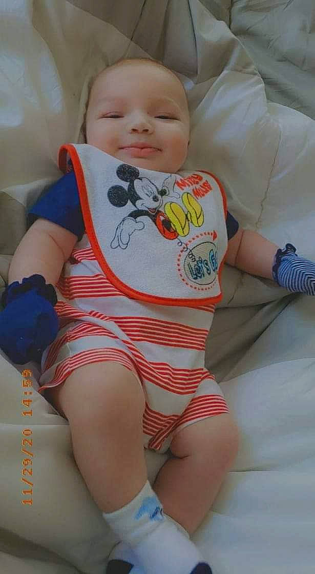 Xavior joined the competition — help win amazing prizes! baby, baby_products, baby_toddler_clothing, cheek, child, comfort, happy, human_leg, knee, linens, pattern, person, sitting, skin, sleeve, smile, stomach, t_shirt, thigh, toddler