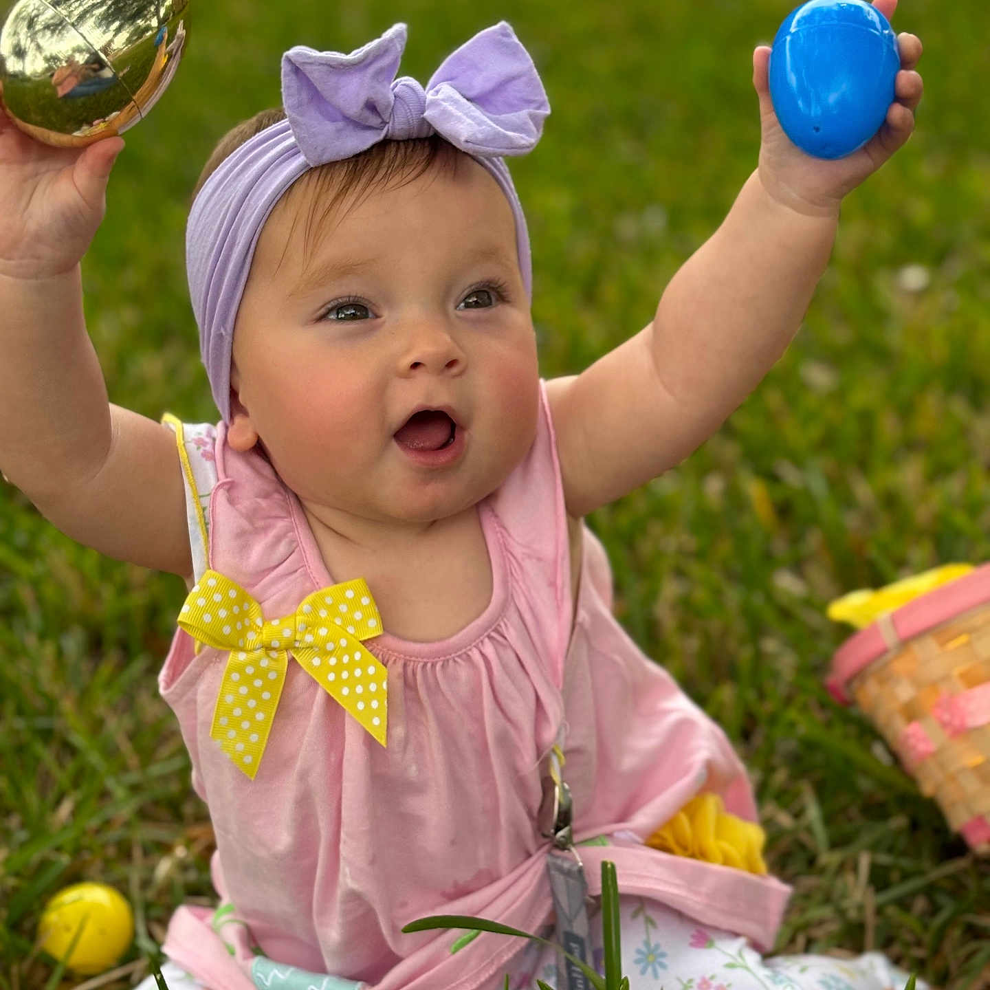 Octavia is registered to the contest to win money with this photo: baby, balloon, bodypart, egg, face, field, finger, food, grass, hand, head, lawn, person, photography, plant, portrait, purple, sitting, sphere, sweets