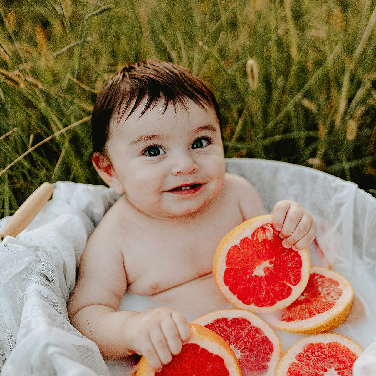 Henry joined the competition — help win amazing prizes! baby, bodypart, citrusfruit, eating, face, finger, food, fruit, grapefruit, grass, hand, happy, head, person, photography, plant, pomelo, portrait, produce, smile