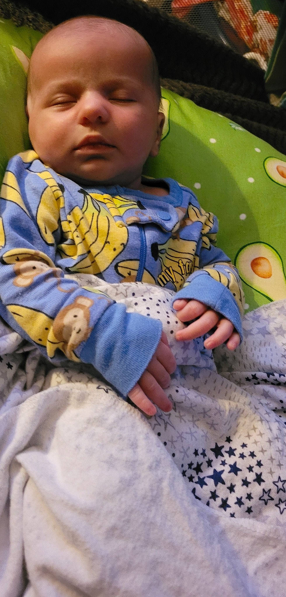 Solomon is registered to the contest to win money with this photo: baby, baby_toddler_clothing, child, eye, fun, grass, happy, human_body, leisure, linens, mouth, nose, pattern, person, photograph, play, product, sitting, skin, thumb