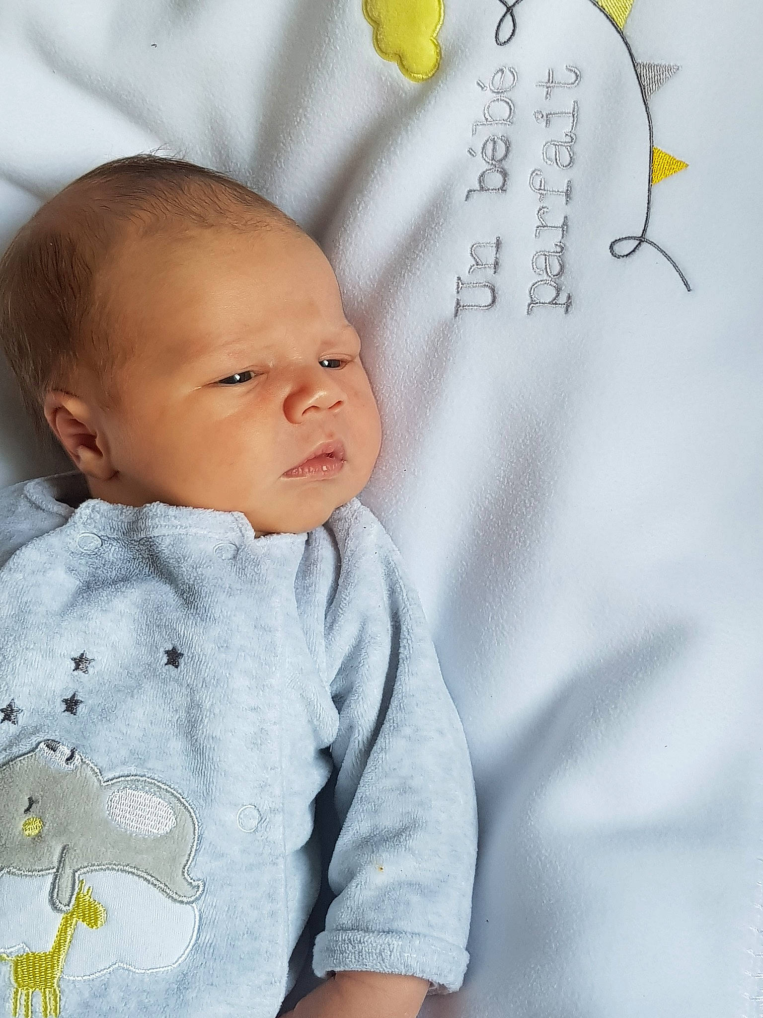 Rawley participe au concours pour gagner de l'argent avec cette photo : baby, baby_sleeping, baby_toddler_clothing, cheek, child, head, nose, person, toddler, yellow