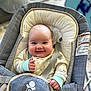 baby, smiling, infant, seat, straps, clothing, indoor, happy, child, face, cute, comfort, safety, person, cheeks, hands, expression, soft, fabric, closeup