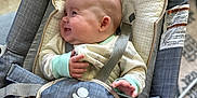 Eleanor joined the competition — help win amazing prizes! baby, infant, smile, pajamas, baby_seat, straps, face, hand, cozy, indoor, carrying_seat, comfort, pattern, star, cushion, child, happy, person, seat, soft