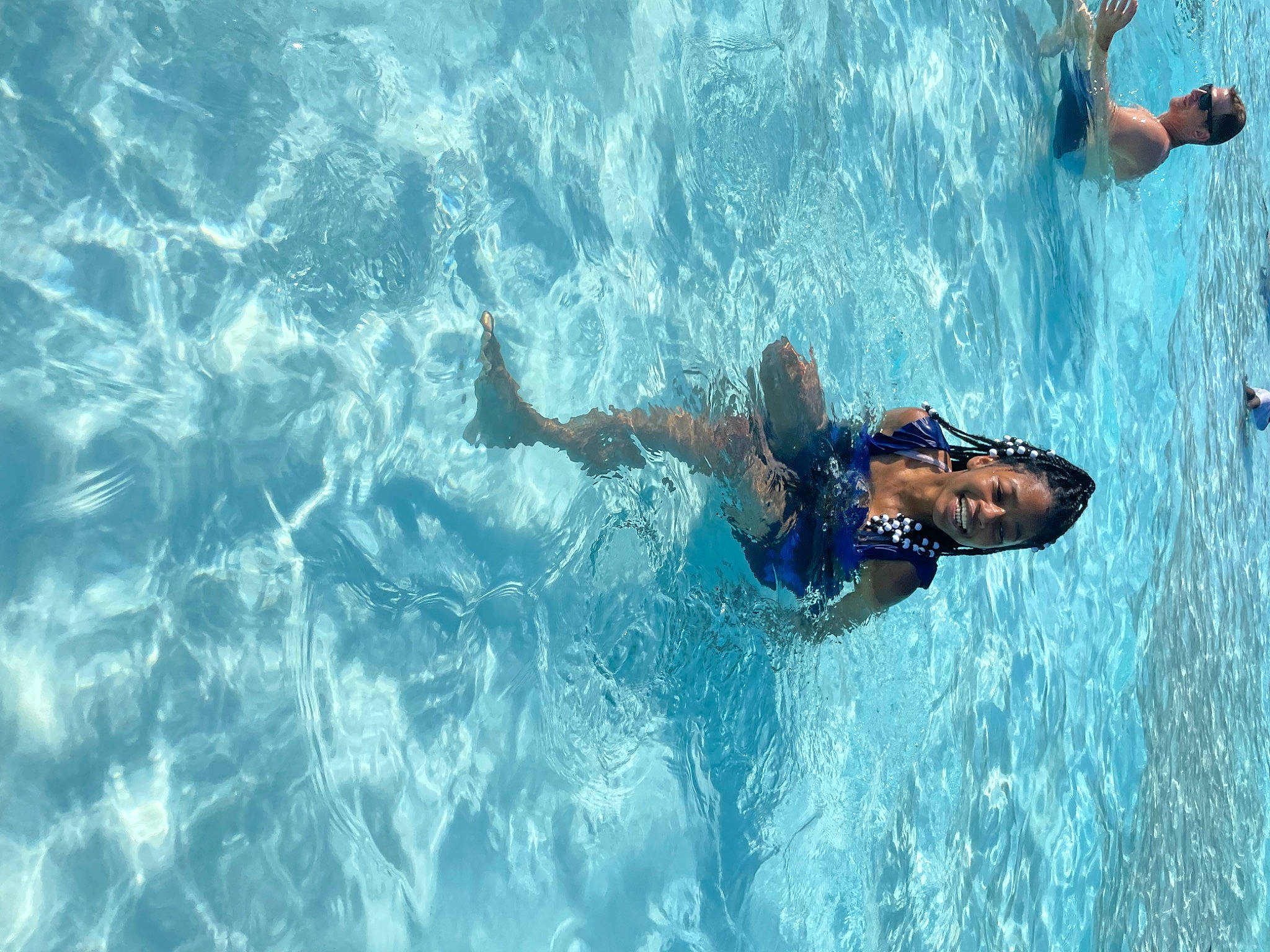 Mylah is registered to the contest to win money with this photo: adventure, azure, extreme_sport, fluid, fun, happy, individual_sports, joy, lake, leisure, leisure_centre, ocean, person, personal_protective_equipment, recreation, sports, swimmer, swimwear, water, water_sport