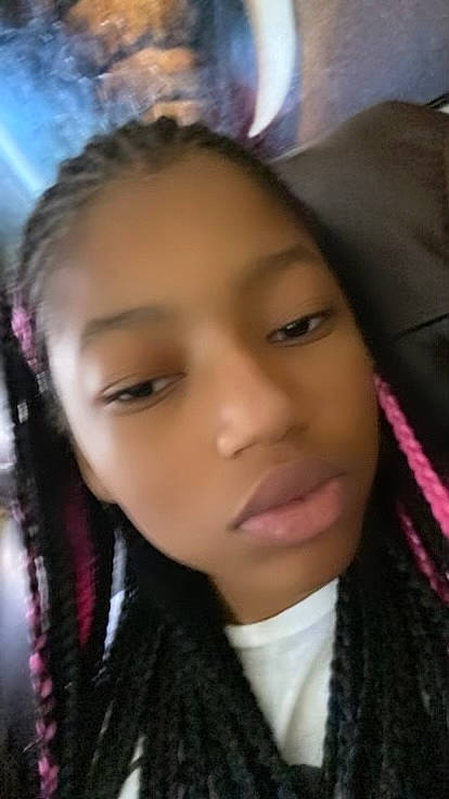 Mylah is registered to the contest to win money with this photo: bangs, black_hair, cheek, child, cool, eyebrow, eyelash, fashion_accessory, forehead, fun, hair_coloring, happy, iris, jaw, lip, long_hair, magenta, nose, person, portrait_photography