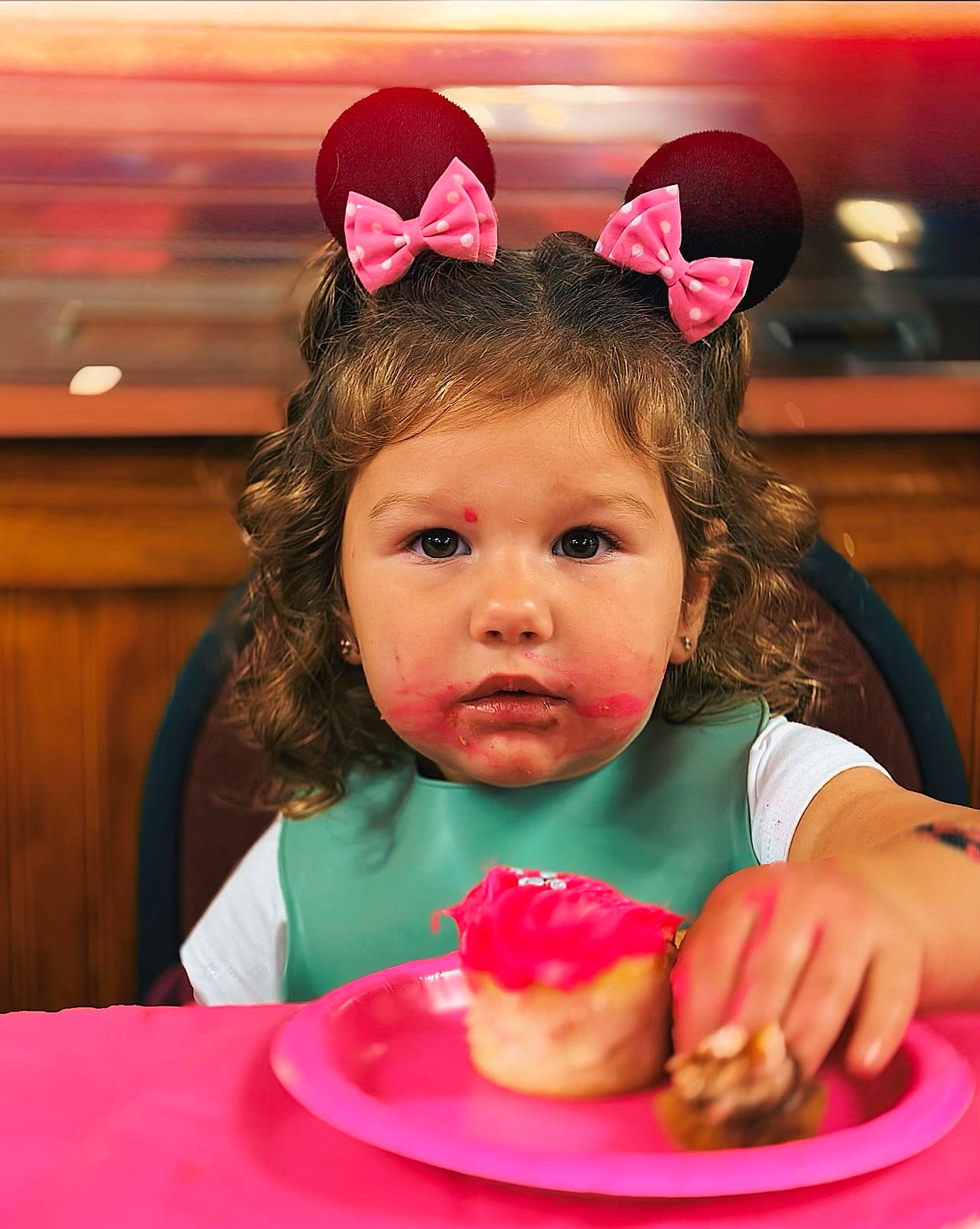 Sienna is registered to the contest to win money with this photo: baked_goods, birthday, birthday_cake, child, cuisine, dessert, dish, event, food, food_craving, fun, happy, icing, ingredient, person, pink, plate, sweetness, table, tableware
