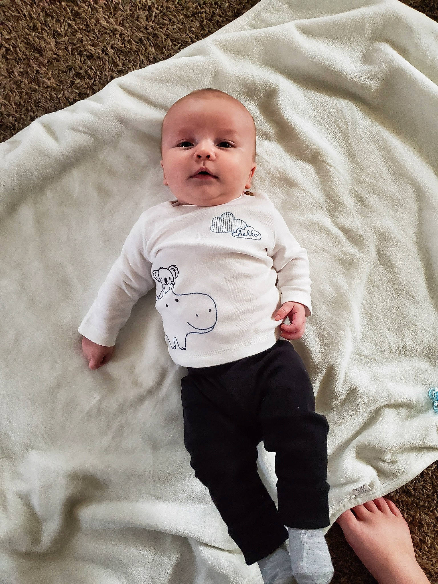 Madden is registered to the contest to win money with this photo: baby, baby_toddler_clothing, child, person, product, skin, sleeve, t_shirt, toddler