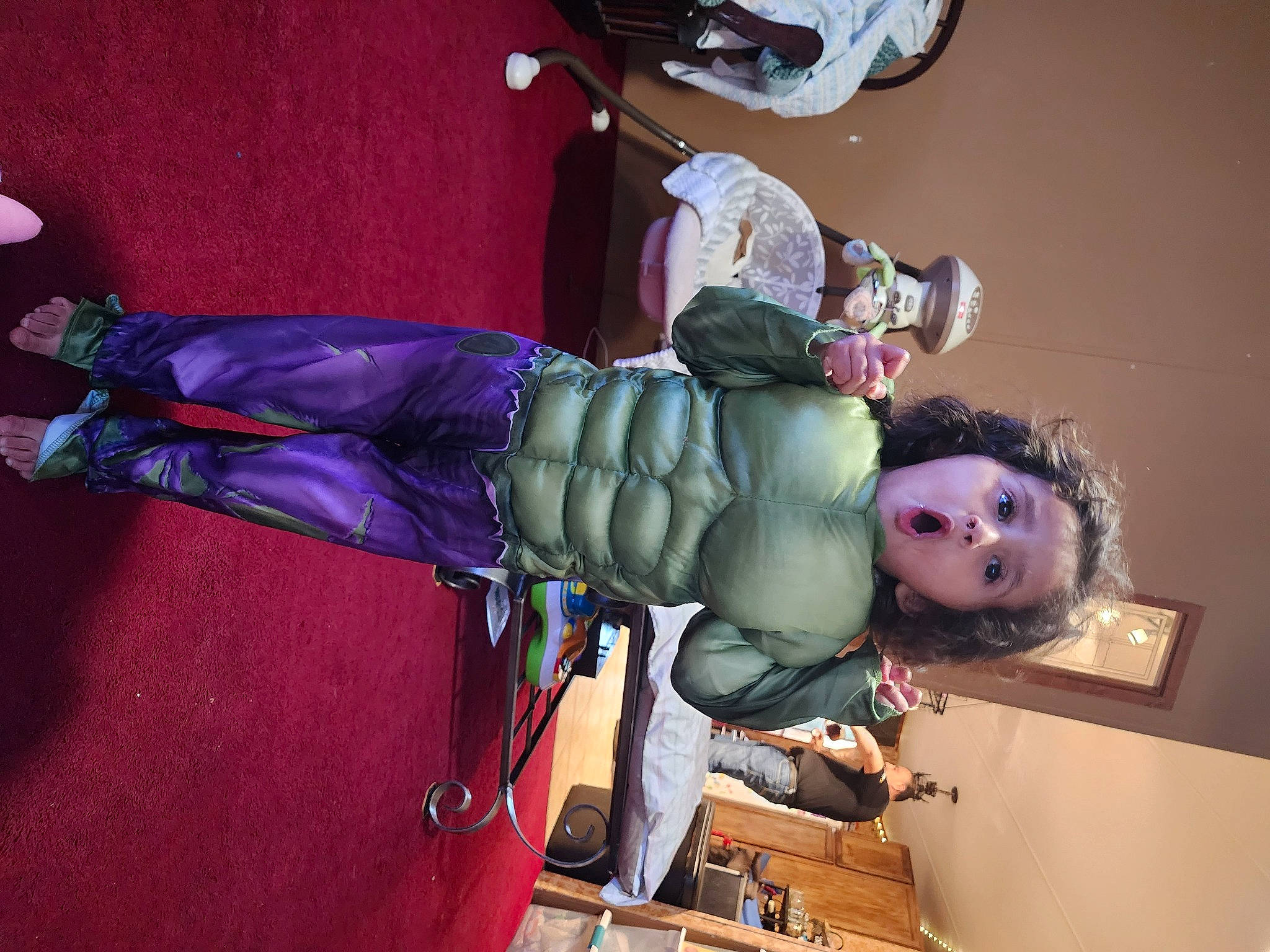 Alaina is registered to the contest to win money with this photo: art, child, costume, fun, magenta, person, pink, purple, room, sitting, surprise, toddler, toy