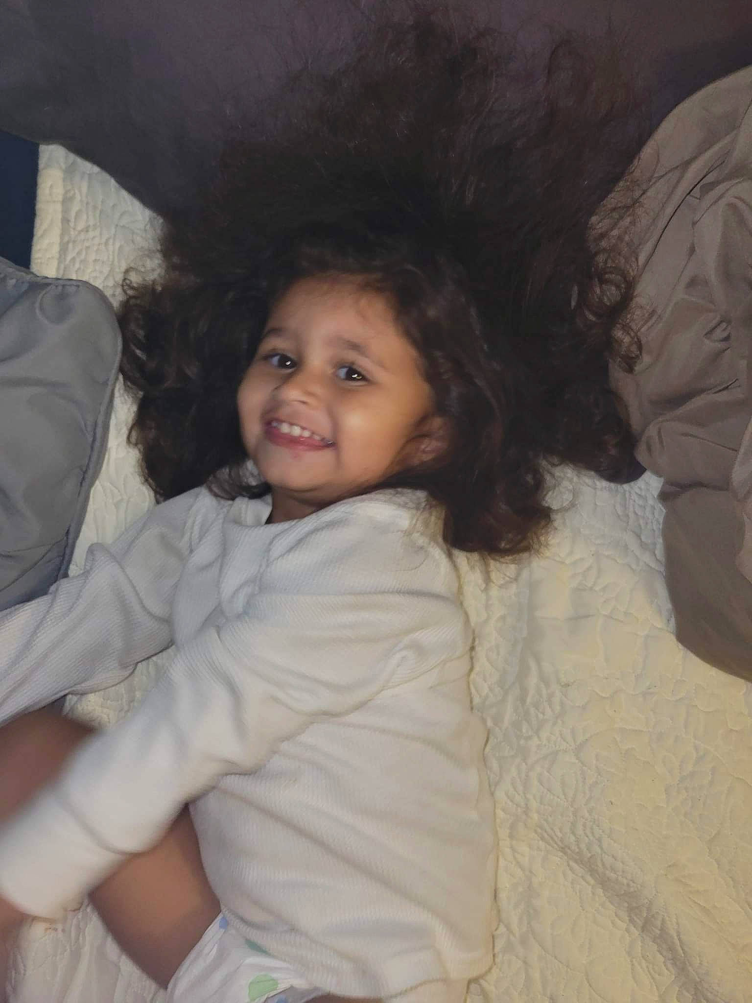 Alaina is registered to the contest to win money with this photo: arm, cheek, chin, comfort, eye, eyebrow, facial_expression, flash_photography, hair, head, human_body, iris, joy, lip, mouth, neck, nose, person, shoulder, skin