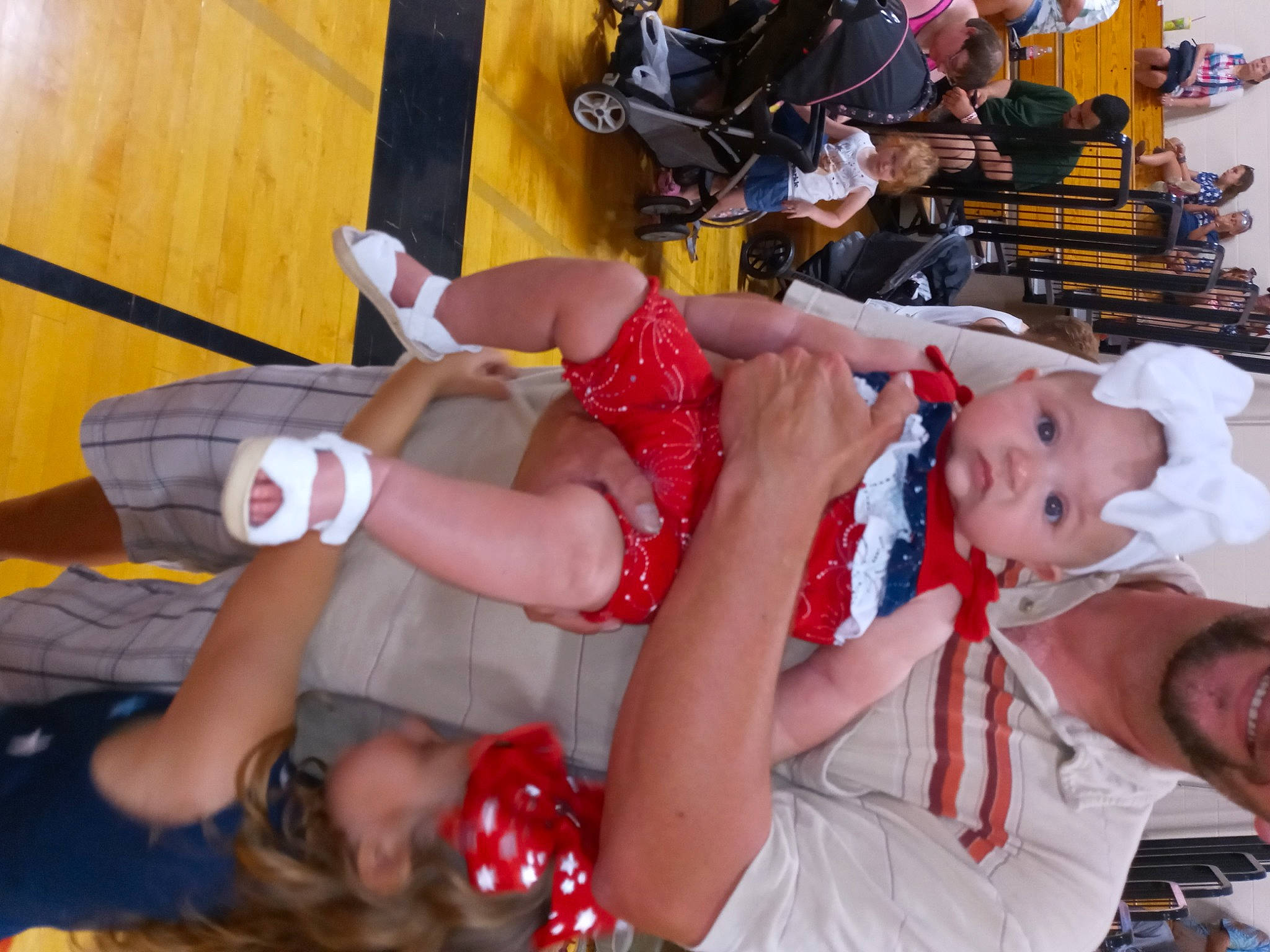 Everleigh is registered to the contest to win money with this photo: arm, baby, baby_toddler_clothing, blurred, carmine, child, costume, dress, event, flesh, fun, happy, hat, human_leg, leisure, mouth, person, shorts, thigh, toddler