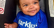 Sincere joined the competition — help win amazing prizes! baby, child, smile, blue_shirt, curly_hair, car_seat, blanket, happy, face, infant, cute, clothing, person, portrait, indoor, young_child, hand, eyes, seat, baby_toddler