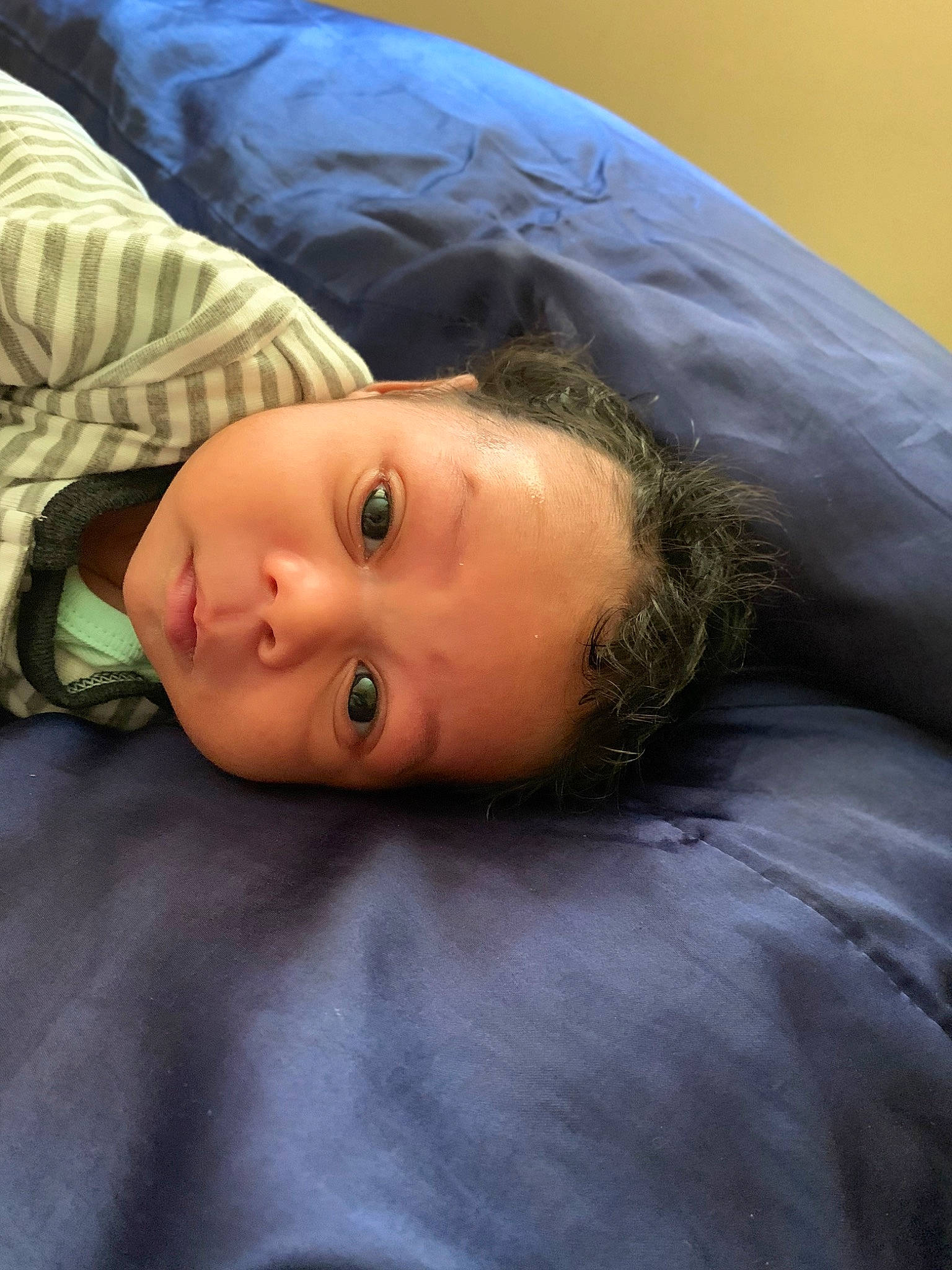 Raziel is registered to the contest to win money with this photo: baby, bedding, cheek, child, comfort, eyebrow, eyelash, flooring, fur, human_body, iris, linens, lip, nose, person, room, sitting, sleep, textile, toddler