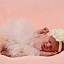 Maelys participe au concours pour gagner de l'argent avec cette photo : adorable, baby, child, closeup, clothing, cute, delicate, flower, headband, infant, newborn, peaceful, pink_background, portrait, resting, skin, sleeping, small, soft, tutu